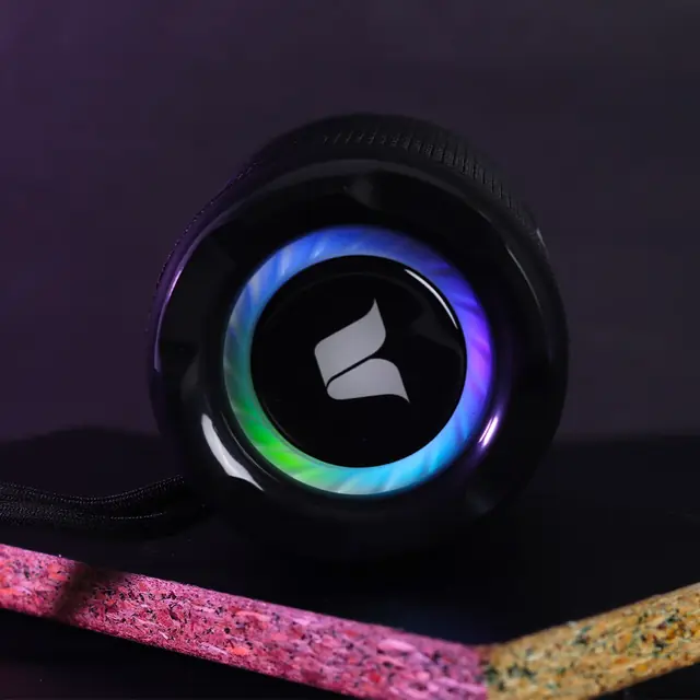 Parlante portátil con aro de luz de colores